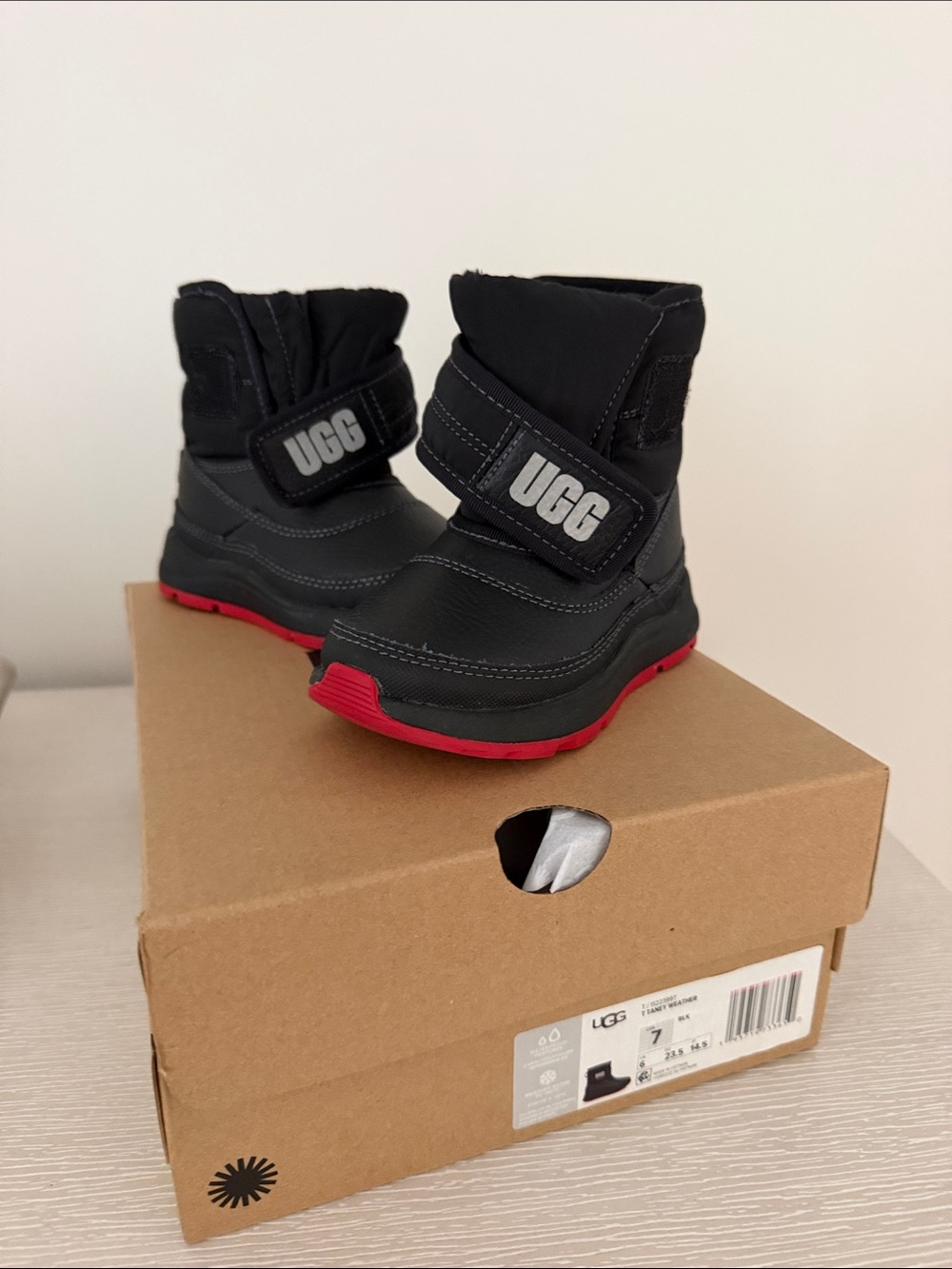 UGG Kids Black Boots with Red Outsole Accents